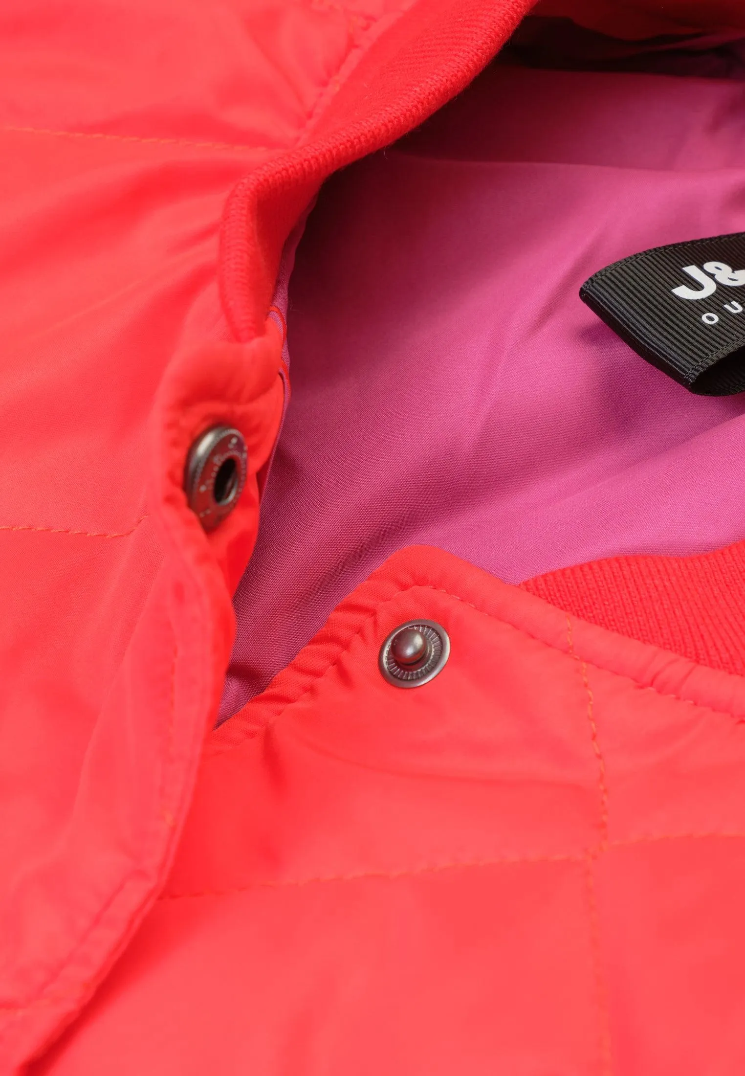 Veste femme orange avec quadrillage façon doudoune